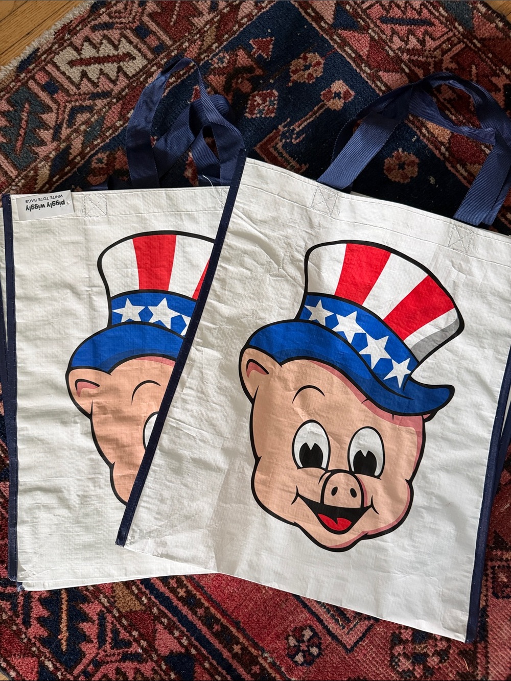 Pair of Patriotic Piggly Wiggly tote bags for America’s 250th